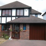Exterior painting of property with pebble dashing